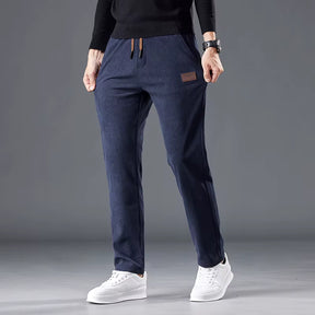 Calça masculina de veludo cotelê com cintura elástica e cordão ajustável, modelo reto para outono e inverno
