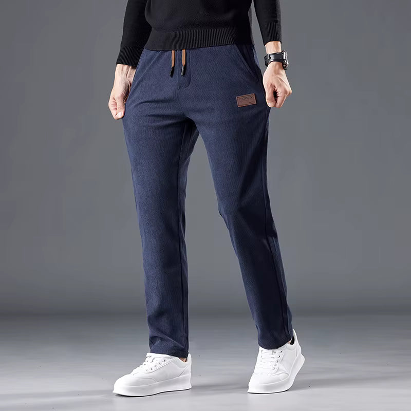 Calça masculina de veludo cotelê com cintura elástica e cordão ajustável, modelo reto para outono e inverno