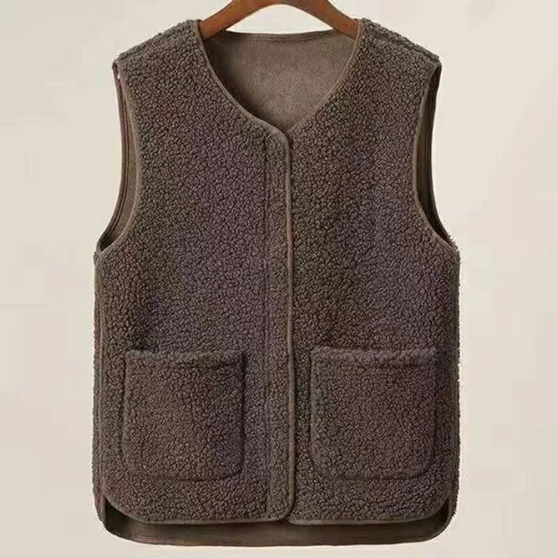 colete masculino fleece com textura aveludada e design minimalista com bolsos frontais para inverno