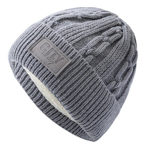 Gorro Térmico Alpine cinza claro em tricô trabalhado com forro interno quente para dias frios.