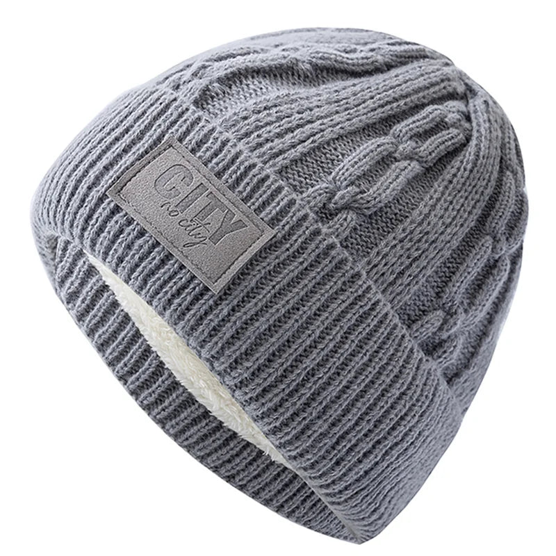 Gorro Térmico Alpine cinza claro em tricô trabalhado com forro interno quente para dias frios.