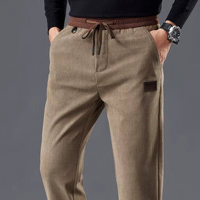 Calça masculina de veludo cotelê com cintura elástica e cordão ajustável, modelo reto para outono e inverno