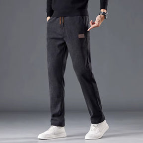 Calça masculina de veludo cotelê com cintura elástica e cordão ajustável, modelo reto para outono e inverno