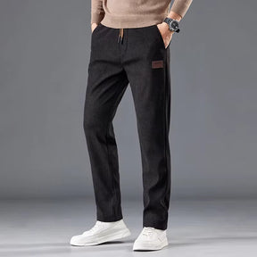 Calça masculina de veludo cotelê com cintura elástica e cordão ajustável, modelo reto para outono e inverno