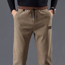 Calça masculina de veludo cotelê com cintura elástica e cordão ajustável, modelo reto para outono e inverno