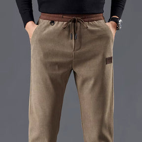Calça masculina de veludo cotelê com cintura elástica e cordão ajustável, modelo reto para outono e inverno