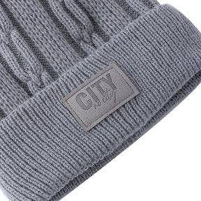 Gorro Térmico Alpine em tricô trabalhado com forro interno quente para dias frios.