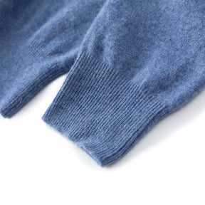 Suéter masculino em lã merino com gola polo e botões frontais dobrado com acabamento elegante
