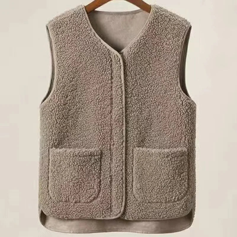 colete masculino fleece com textura aveludada e design minimalista com bolsos frontais para inverno