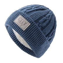 Gorro Térmico Alpine em tricô trabalhado com forro interno quente para dias frios.