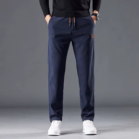 Calça masculina de veludo cotelê com cintura elástica e cordão ajustável, modelo reto para outono e inverno
