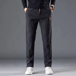 Calça masculina de veludo cotelê com cintura elástica e cordão ajustável, modelo reto para outono e inverno