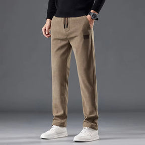 Calça masculina de veludo cotelê com cintura elástica e cordão ajustável, modelo reto para outono e inverno