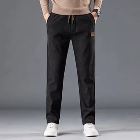 Calça masculina de veludo cotelê com cintura elástica e cordão ajustável, modelo reto para outono e inverno