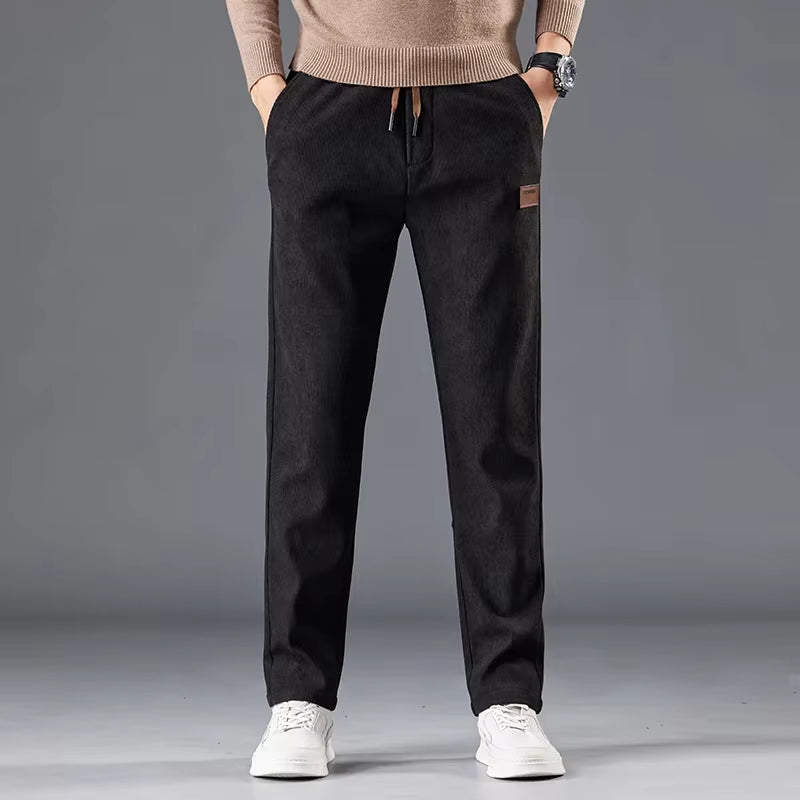 Calça masculina de veludo cotelê com cintura elástica e cordão ajustável, modelo reto para outono e inverno