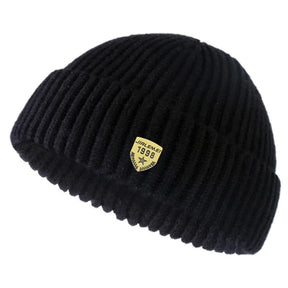 Gorro Unissex Brooklyn Knit em tricô canelado com design moderno e estilo urbano para inverno.