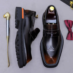 Sapato social loafer masculino premium com detalhes brogue sofisticados e solado robusto contemporâneo