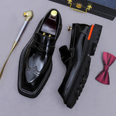 Sapato social loafer masculino premium com detalhes brogue sofisticados e solado robusto contemporâneo