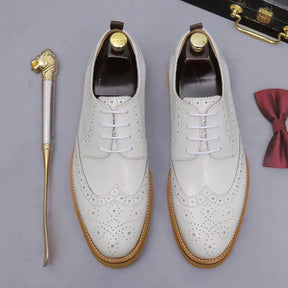 Sapato social Oxford Wingtip masculino premium com design brogue sofisticado e solado tratorado moderno