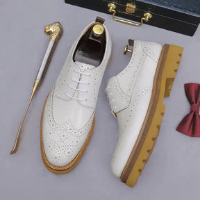 Sapato social Oxford Wingtip masculino premium com design brogue sofisticado e solado tratorado moderno